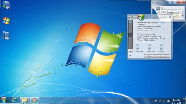 Microsoft Security Essentials���л���ʾ��ͼ��Windows 7���棬��̨���а�ȫɨ�裬��������ʾ�̶�ͼ�꣬ϵͳ����